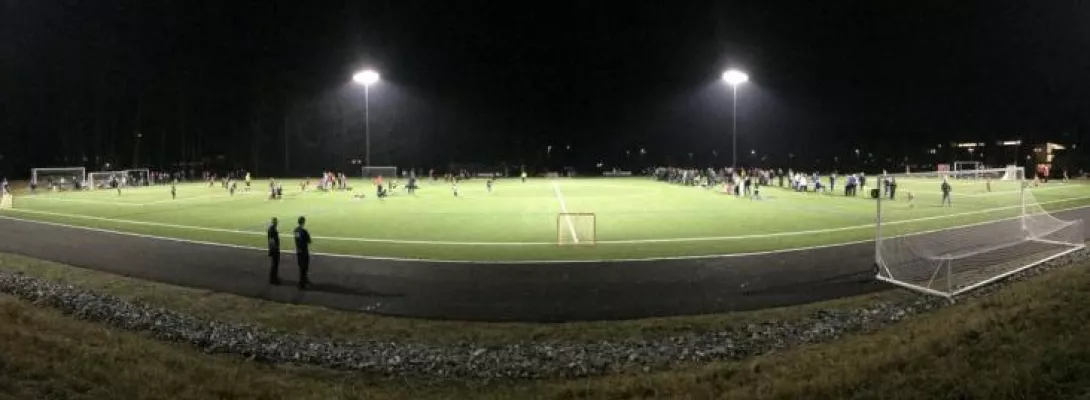 Soccer field at night under the lights