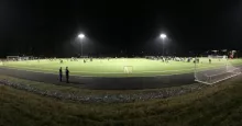 Soccer field at night under the lights